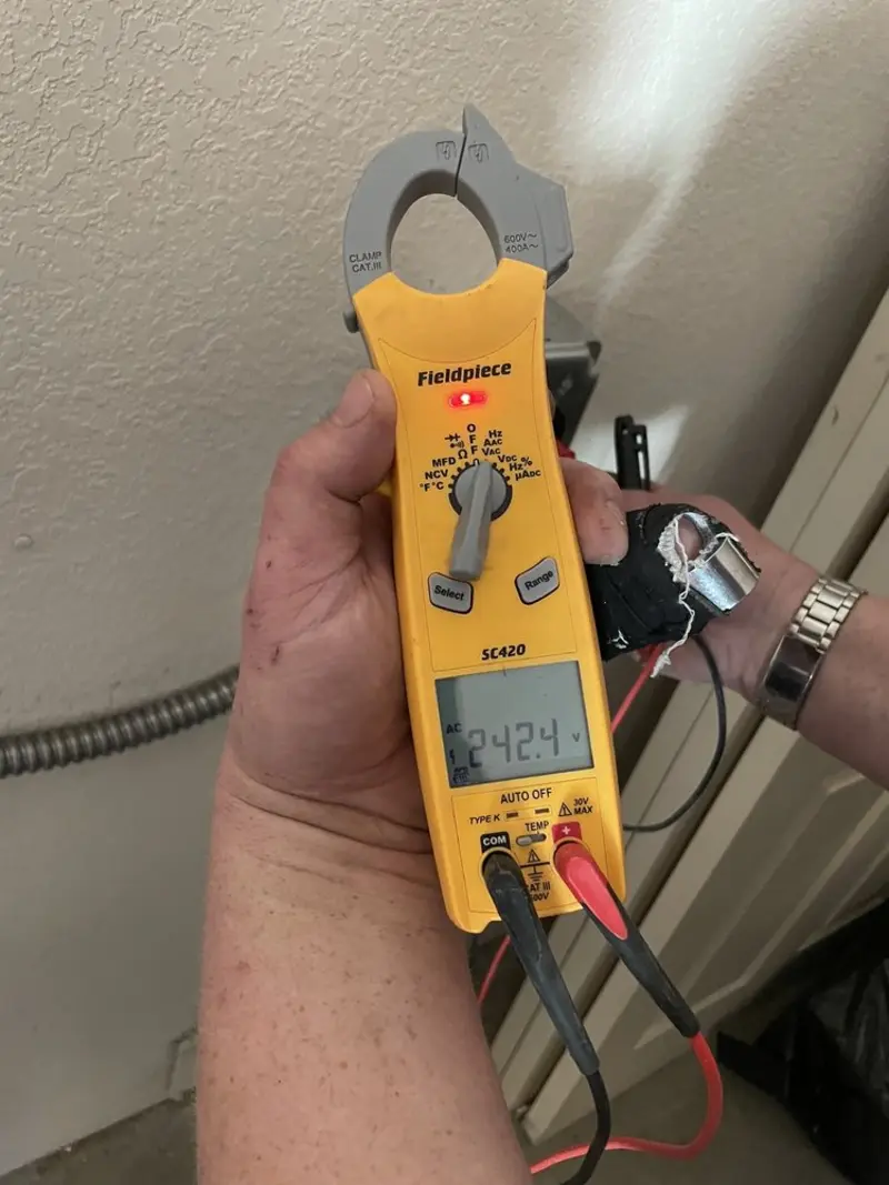 Voltage testing with clamp meter during Generator Installation in South Pasadena